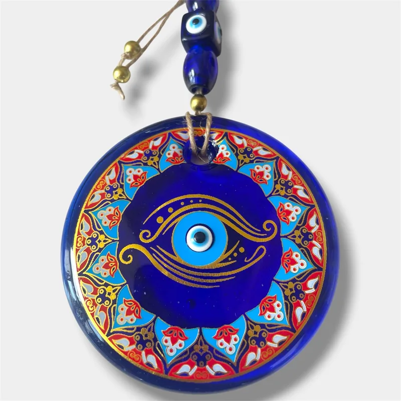Œil de Nazar bleu profond aux motifs ottomans rouges et dorés, fait main en Turquie